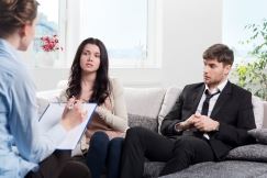 Couple with divorce mediation lawyer