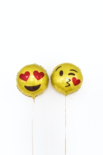 heart face emoji balloons